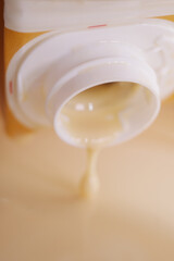 Close up of pouring almond milk.  Almond milk is an excellent source of vitamin E