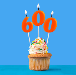 Candle number 600 - Number of followers or likes.