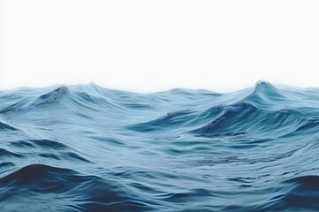 Abstract Blue Ocean Waves Rolling Under White Sky
