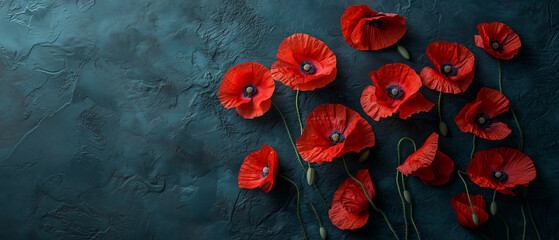 Bright spring poppies scattered on a dark textured canvas, creating a striking floral composition
