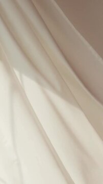 An Elegant Beige Cloth Motion Video Template Background.