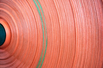 The weaving workshop machinery of a certain packaging factory is running, producing new fiber ropes and fiber bags