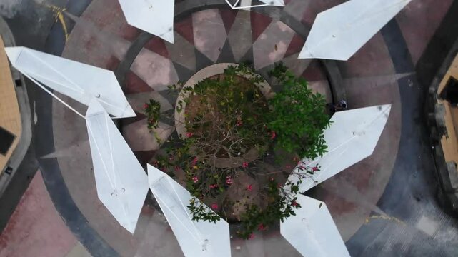 Aerial rotating top down drone shot of an architectural building. Unique architectural pattern from top down perspective