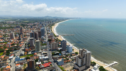 Aerial view of Balneário Piçarras, a rapidly growing coastal city in Santa Catarina, Brazil, highlighting its urban expansion and beachfront development.