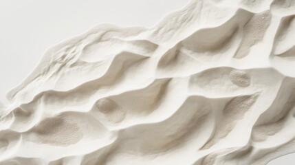 Obraz premium top view of light beige sand, cascading and piled in a heap against a pure white background,