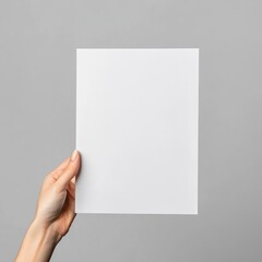 Obraz premium Blank White Paper Mockup Hand Holding Square Card