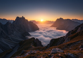 Fototapeta premium sunrise over the mountains and clouds