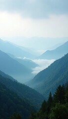 Naklejka premium Foggy, misty landscape with distant mountains, fog, mountains