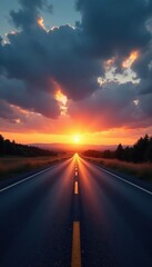 Fototapeta premium Gray asphalt road with scattered dark clouds at sunrise, grayasphalt, lonely