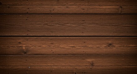 Naklejka premium Dark brown wood planks create a rustic background.