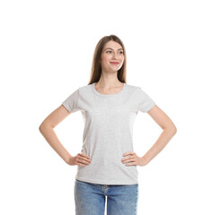 Obraz premium Woman wearing blank t-shirt on white background. Mockup for design