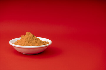 Curcuma longa - Turmeric is a very healthy species in spoon and bowl