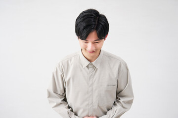 男性　お辞儀　20代　白背景