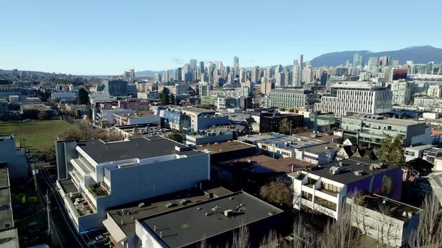 Downtown Vancouver Skyline Seen From Rooftop Of Corporate Office Near Jonathan Rogers Park In Fairview, Canada. - aerial shot
