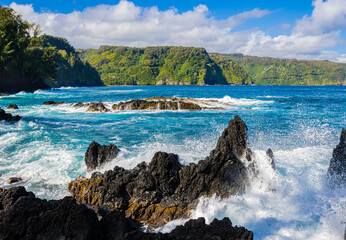 Waves Washing Against The Jagged Lava Spires in Nua' Ailua Bay, Keanae, Maui, Hawaii, USA