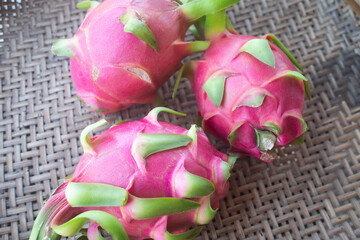 pink dragon fruit on wooden background
