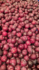 fresh black plums in the market