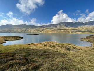 Fototapeta premium The alpine lake Tannensee or Tannen Lake in the Uri Alps mountain massif, Kerns - Canton of Obwalden, Switzerland (Kanton Obwald, Schweiz)