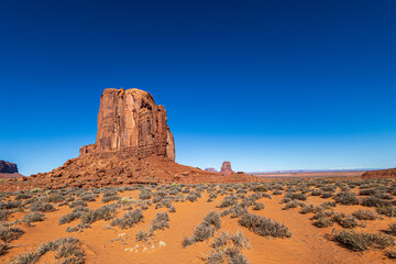 Beautiful Monument Valley seen from Monument Valley Scenic Drive. The drive is a 17-mile loop on a...