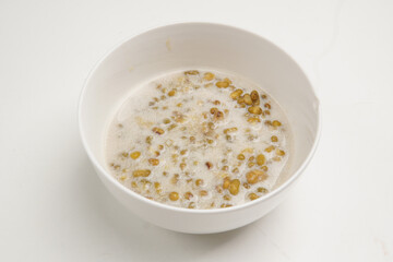 Bowl of Mung Bean Porridge or Bubur Kacang Hijau, Indonesian dessert porridge of mung beans.