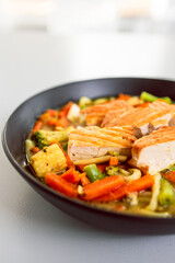 green curry vegetable noodles with pan-fried tofu, healthy  Asian food