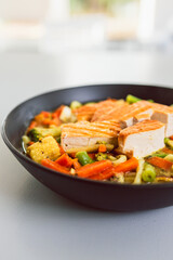 green curry vegetable noodles with pan-fried tofu, healthy  Asian food
