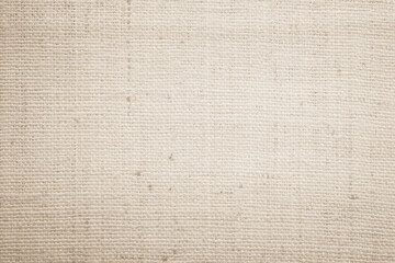 Brown sackcloth woven texture background in natural pattern. Jute hessian burlap, linen background in light beige cream color blank. Weaving canvas fiber line cotton cloth textured as organic.