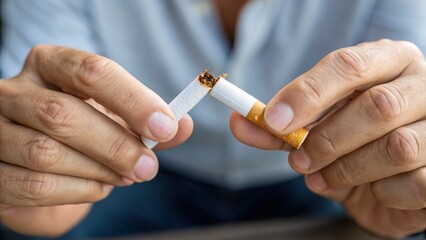 Quit Smoking: Hands Break Cigarette