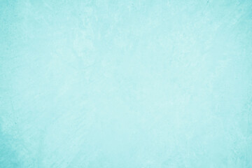 Pastel blue and white concrete stone texture for background in summer wallpaper. Cement and sand wall of tone vintage. Concrete abstract wall of light cyan color, cement texture mint green for design.
