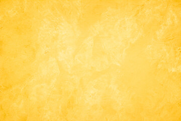 Yellow concrete stone texture for background in summer wallpaper. Cement and sand wall of tone vintage minimal. Concrete abstract wall of light yellow color, cement texture white blank for home decor.