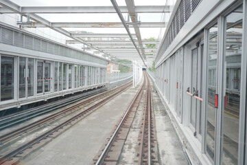 Elevated train tracks and station structure in urban environment