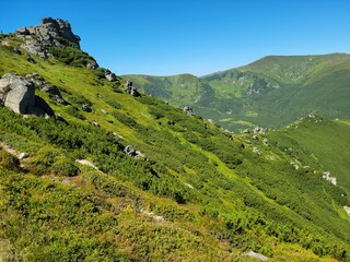 Naklejka premium View from Vukhatiy Kamin mountain to Chornohirsky ridge