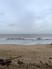 Photo of wave and beach in the morning