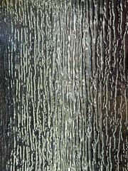 Close up of textured rain glass pattern. 3D textured glass in rain pattern. Seamless background texture