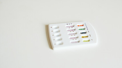 Multi-Disease Rapid Test Kit on White Background.