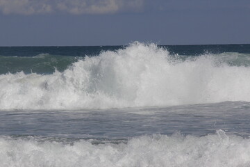 waves crashing on the beach