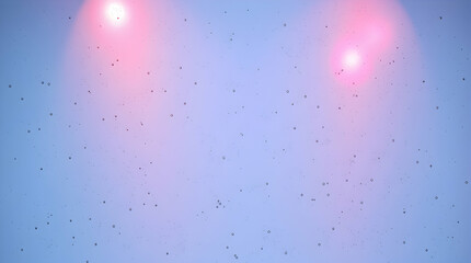 A light blue surface with a subtle texture and two pink light spots at the top.