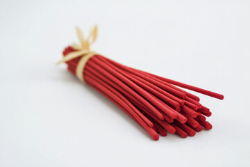 bouquet of red incense sticks