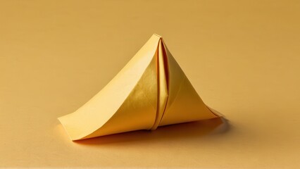  a beautifully crafted origami figure resting on a warm backdrop