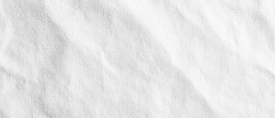 White textured fabric, subtly wrinkled, soft light