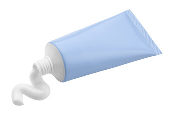 Blue tube and some white cream squeezed out of it isolated on white