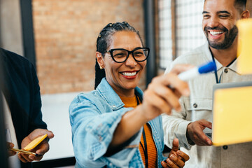 Members of a startup brainstorming during a creative workshop session