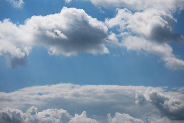 Bright Sky with Soft White Clouds on a Sunny Day