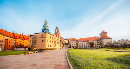 Wawel castle landmark with city view near river in Krakow Poland. Autumn landscape on coast river Wisla.