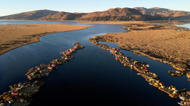 Peru Lake Titicaca Uros ancient culture man-made aquatic plant totora islands, aerial view