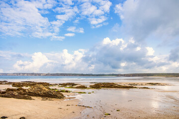 Beautiful view at a sand beach by the sea at Anse de dinan in Bretagne, France