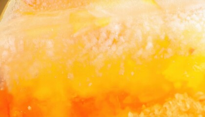 macro shot of frozen orange and yellow citrus fruit slice with icy texture, abstract vibrant background for food concepts

