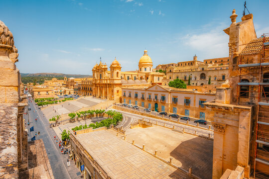 view in Noto, with the Basilica Minore di San Nicolo and Palazzo Ducezio, Sicily, Italy. Chiesa di Santa Chiara.