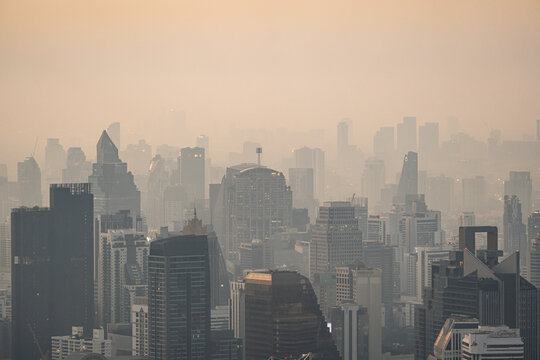 An aerial view showing the city in Bangkok. PM 2.5 around Bangkok, Road with traffic jams. PM 2.5 dust covering the entire city.
