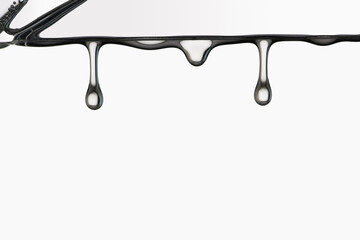 Water drop falling from a ice cube
